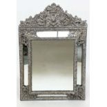 DUTCH WALL MIRROR, 19th century Dutch repoussé silvered metal cushion frame, marginal plates and