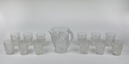 LALIQUE WATER PITCHER, frosted chene oak leaf design with twelve glasses. (13)