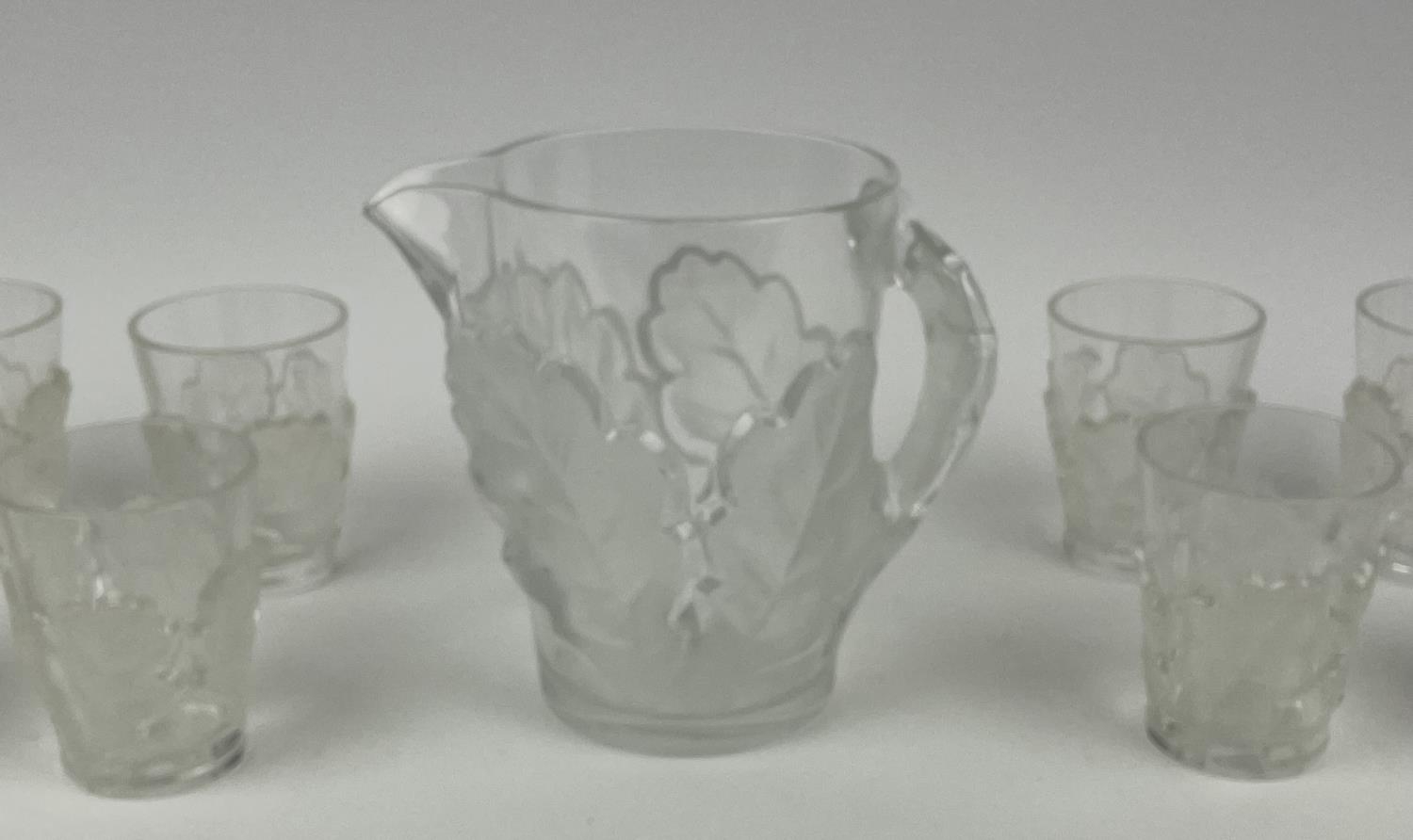 LALIQUE WATER PITCHER, frosted chene oak leaf design with twelve glasses. (13) - Image 13 of 14