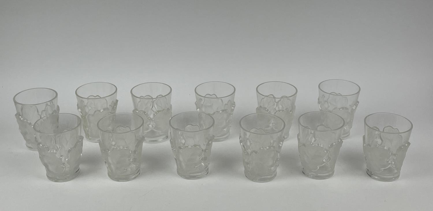 LALIQUE WATER PITCHER, frosted chene oak leaf design with twelve glasses. (13) - Image 11 of 14