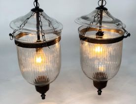 BELL JAR HALL LANTERNS, a pair, glass reeded tapering and bronze style mounted, 58cm H x 34cm. (2)