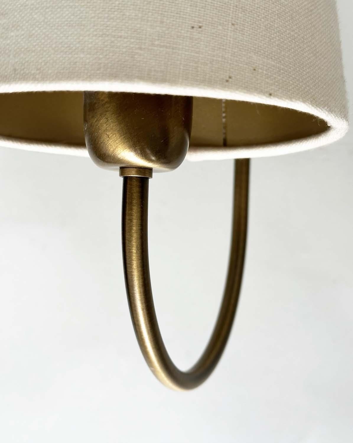 HEATHFIELD & CO WALL SCONCES, a set of four, bent gilt metal each with two branches and conical - Image 4 of 4