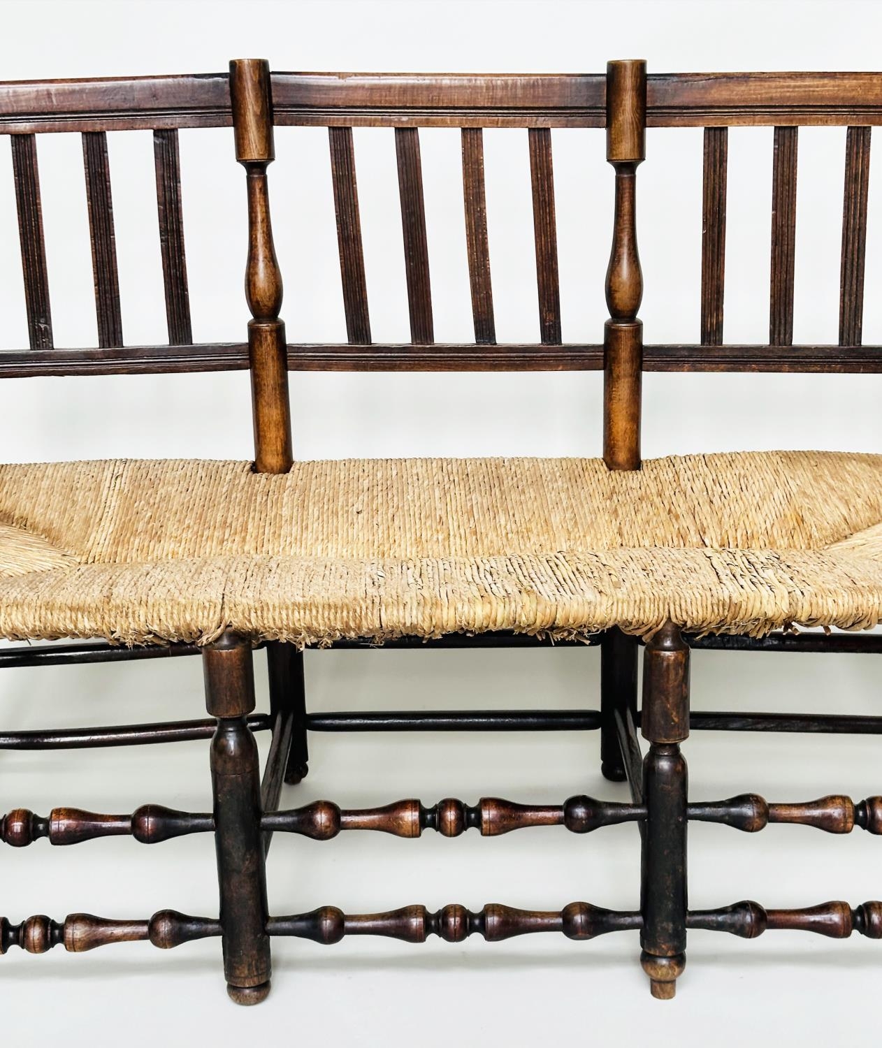 HALL BENCH, 19th century English fruitwood with slatted back, rush seat and turned stretchers, 145cm - Image 4 of 16