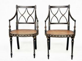 ARMCHAIRS, a pair, Regency style black lacquered and gilt painted with lattice backs and cane seats,
