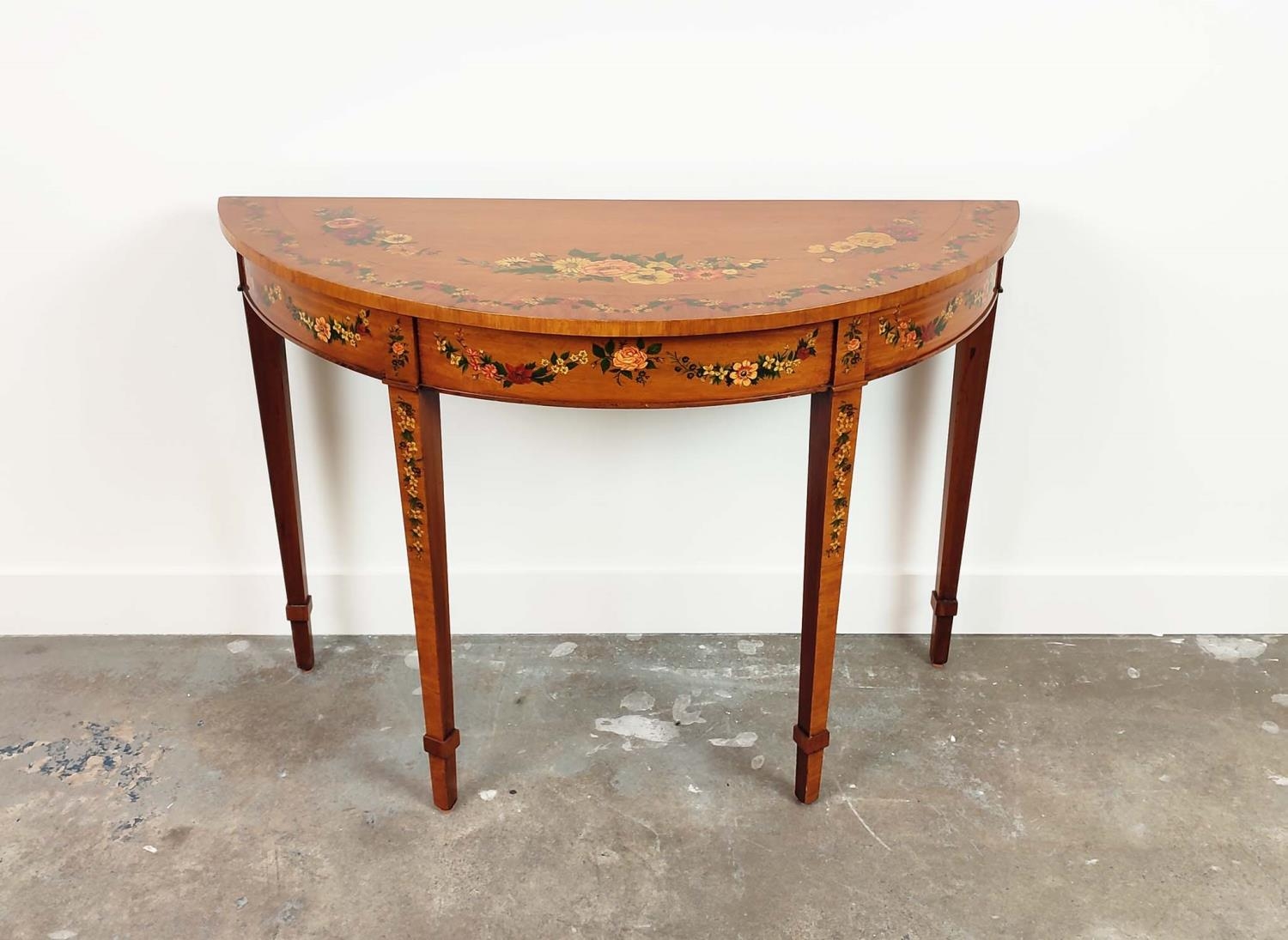 SHERATON STYLE DEMI LUNE SIDE TABLE, late 20th century satinwood and floral painted, 77cm H x