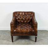 LIBRARY ARMCHAIR, oak in close nailed buttoned brown leather, 5cm H x 80cm W x 79cm D.