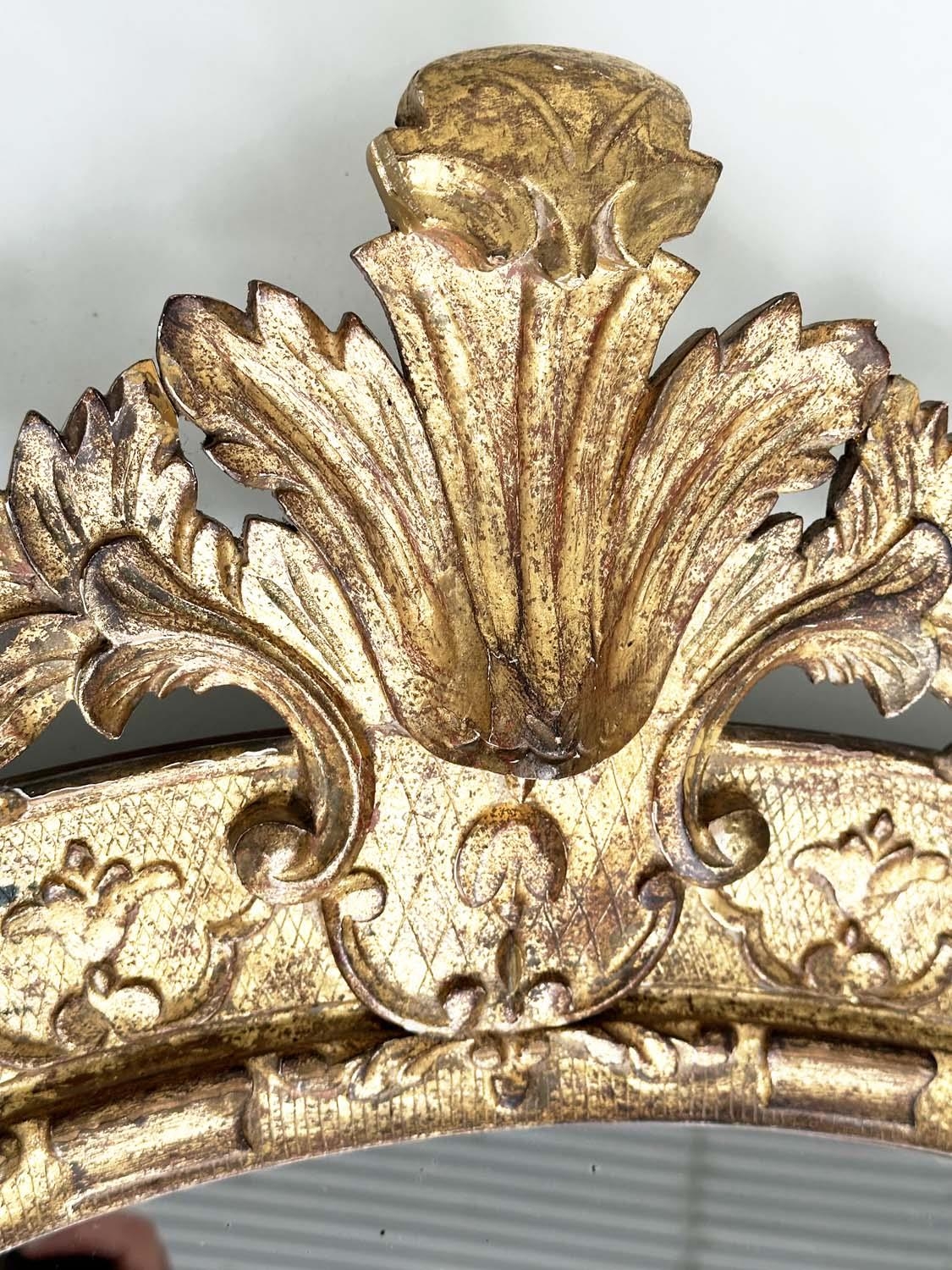 WALL MIRROR, early 19th century Italian carved giltwood grotto style arched with foliate crest, 76cm - Image 2 of 10