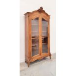 BIBLIOTHEQUE, circa 1890, French walnut with two glazed doors enclosing shelves, 259cm H x 172cm W x