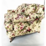 SOFA BY HANCOCK AND MOORE, country house style rose print with arched back, scroll arms, turned