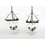 HALL LANTERNS, a pair, glass and bronzed metal each with three lights, 40cm H x 23cm. (2)