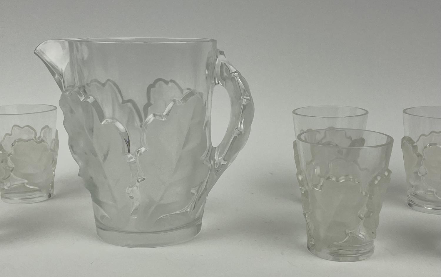 LALIQUE WATER PITCHER, frosted chene oak leaf design with twelve glasses. (13) - Image 12 of 14