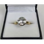 AN 18CT GOLD AND PLATINUM SET DIAMOND SOLITAIRE RING, transitional cut stone of approximately 2.17