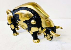 CONTEMPORARY SCHOOL SCULPTURE, bull figure in bronze, 31cm H x 62cm L x 15cm W.