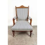 AESTHETIC ARMCHAIR, Victorian oak and ebonised, circa 1870, in blue and white ticking on ceramic