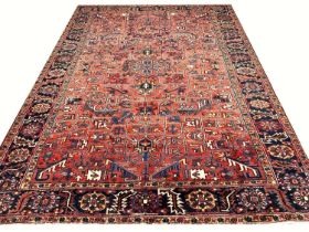 ANTIQUE PERSIAN HERIZ CARPET, 355cm x 270cm.