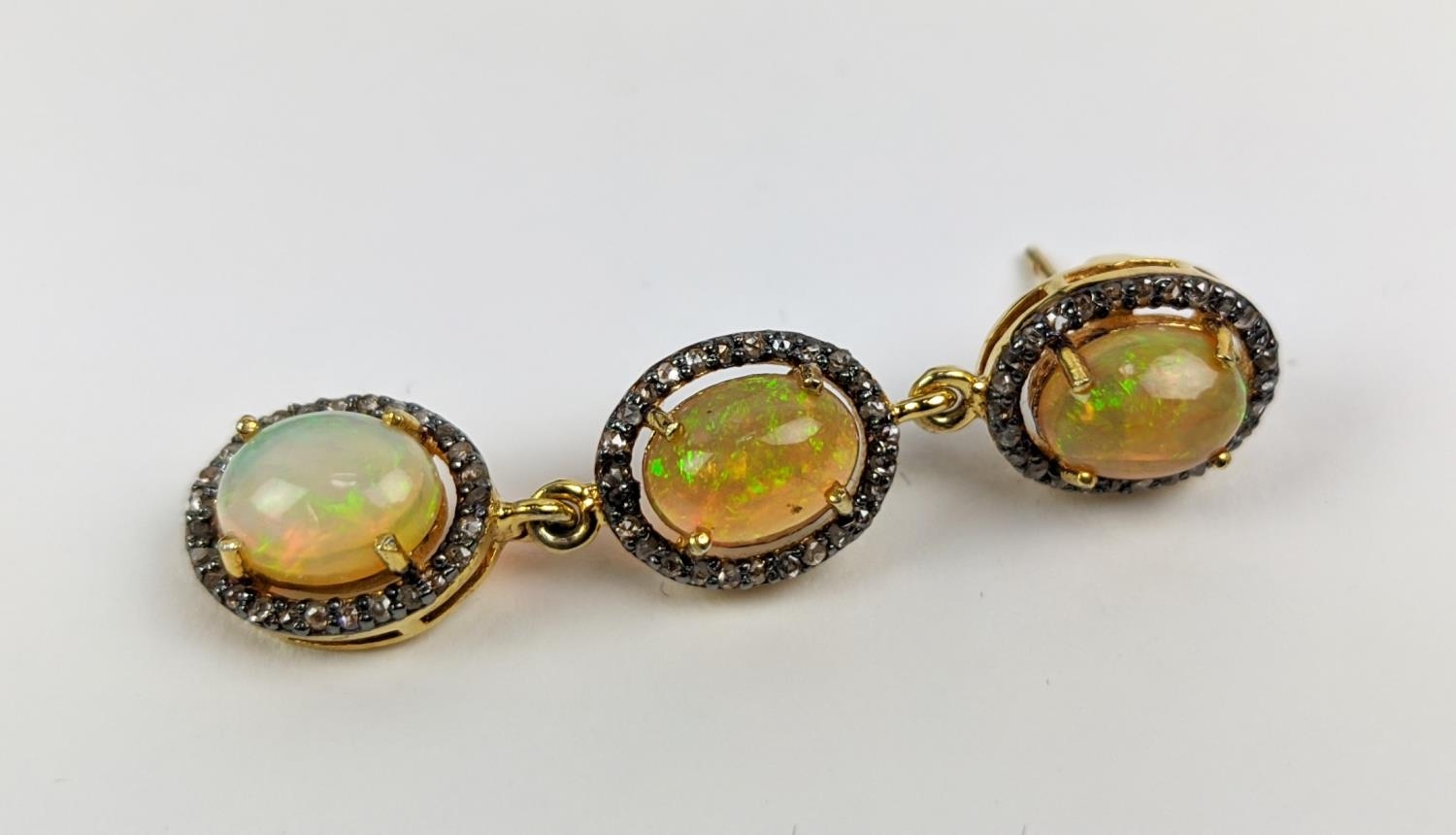 A PAIR OF SILVER-GILT OPAL AND DIAMOND SET PENDANT EARRINGS, of triple sectioned droplet form, - Image 6 of 7