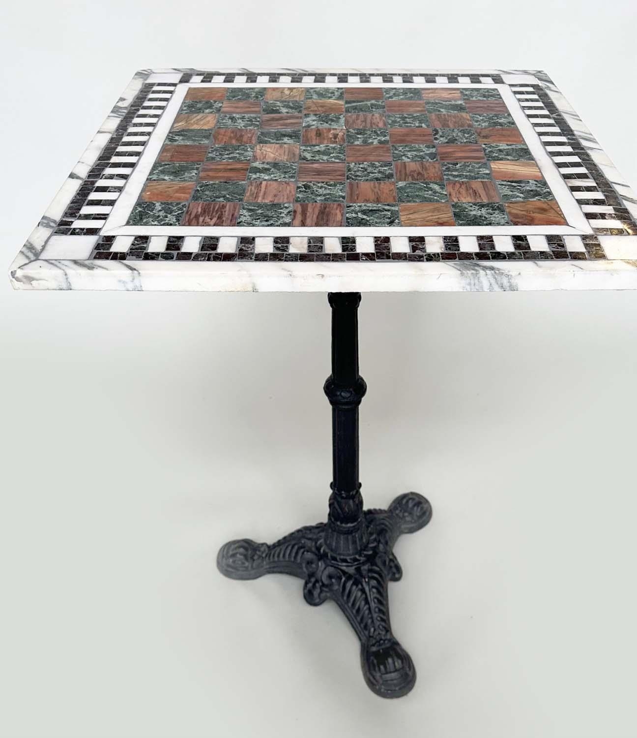 MARBLE TABLE, square games inset top on cast iron triform base, 56cmx 56cm x 73cm H.