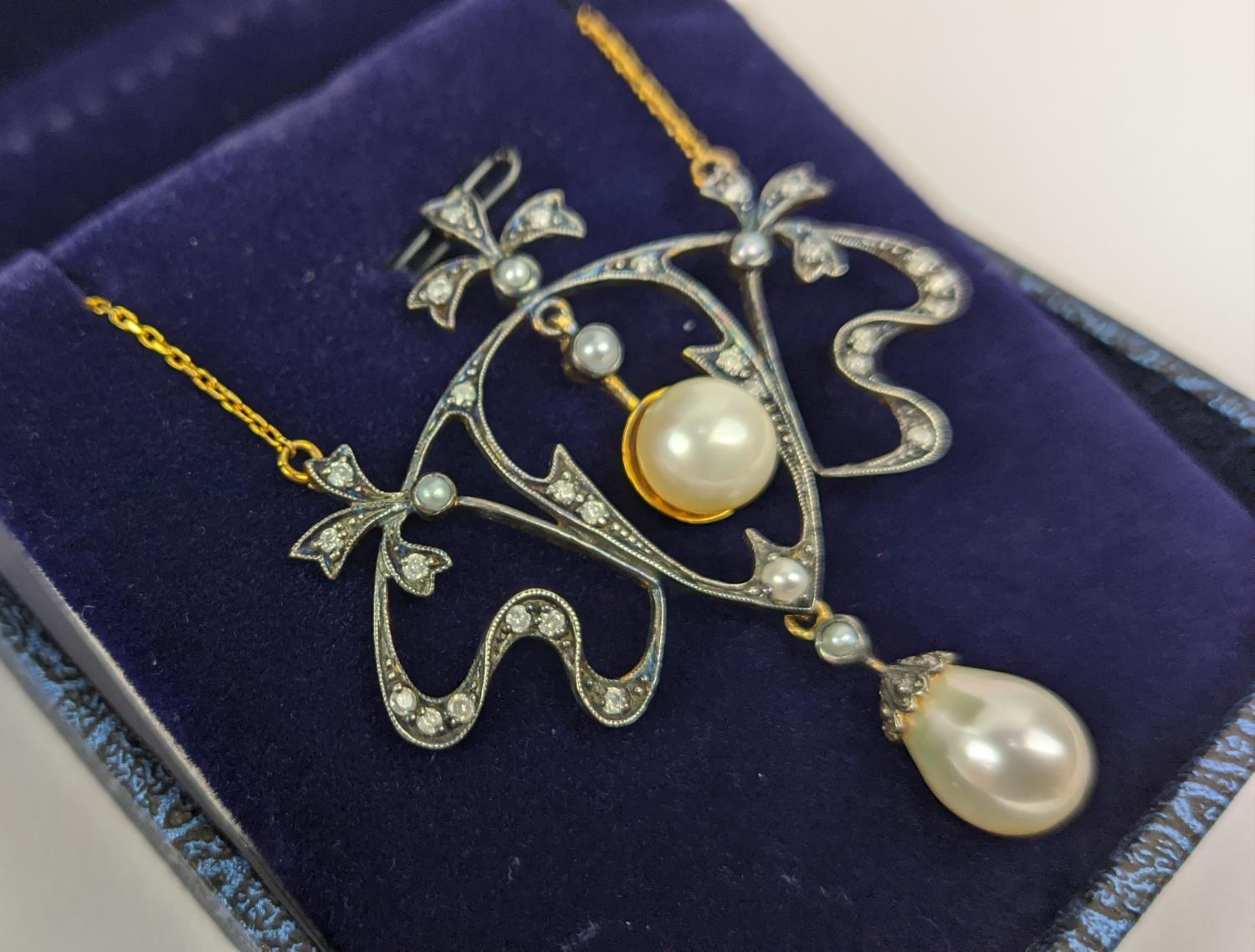 AN ART NOUVEAU STYLE 9CT WHITE AND YELLOW GOLD PENDANT NECKLACE, set with diamonds and pearls, - Image 3 of 5