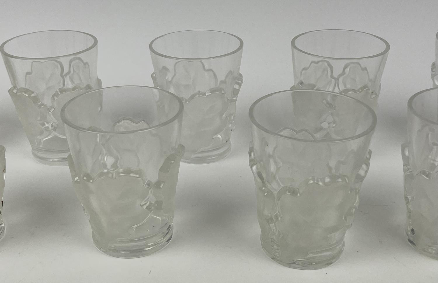 LALIQUE WATER PITCHER, frosted chene oak leaf design with twelve glasses. (13) - Image 10 of 14