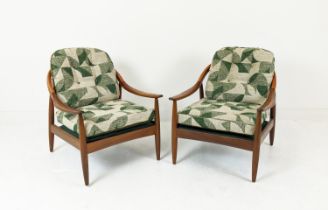 ARMCHAIRS, a pair, mid 20th century Danish teak with geometric patterned and green plush cushions,