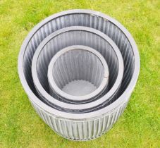 PLANTERS, a graduated set of three, metal, 50cm x 45cm x 45cm large. (3)