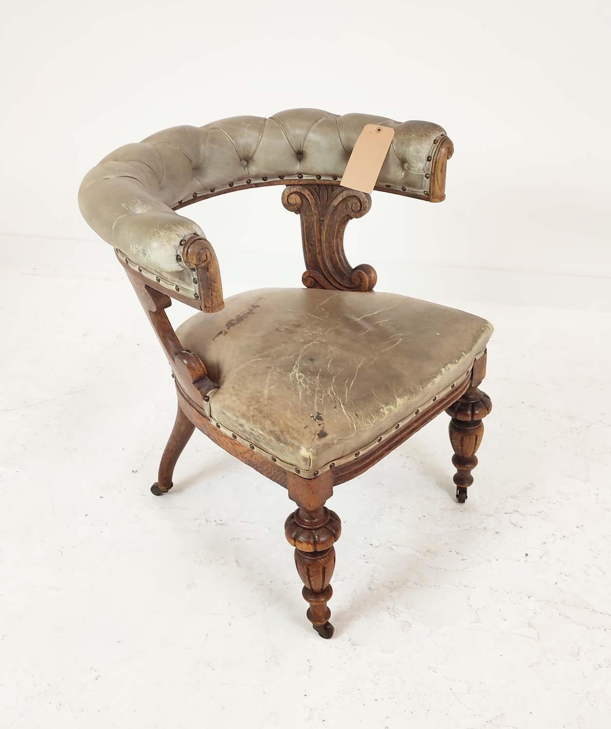 DESK CHAIR, Victorian with green leather upholstery and carved oak frame, 73cm W x 80cm H.