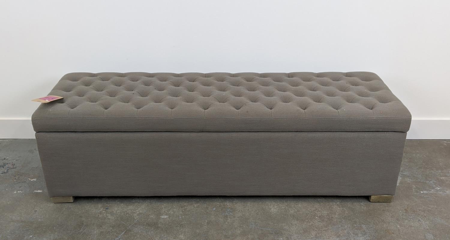 OTTOMAN, with a grey buttoned rising lid, 147cm x 48cm x 46cm H.