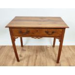 SIDE TABLE, George III walnut, circa 1790, single drawer, applied fret work, raised on square