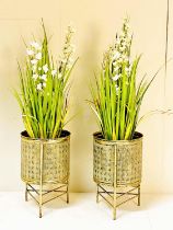 FAUX FLORAL DISPLAYS, a pair, in gilt metal planters, 110cm H x 32cm W (2)