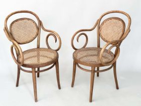 ELBOW CHAIRS, a pair, Thonet style bentwood and caned panelled labelled 'Dinette', 53cm W. (2)