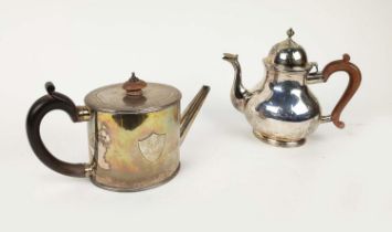 A LATE VICTORIAN SILVER TEAPOT, London 1897, together with a further teapot, of baluster form,