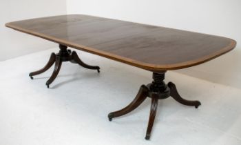 TWIN PEDESTAL DINING TABLE, Regency style mahogany with satinwood banded top and two extra leaves,