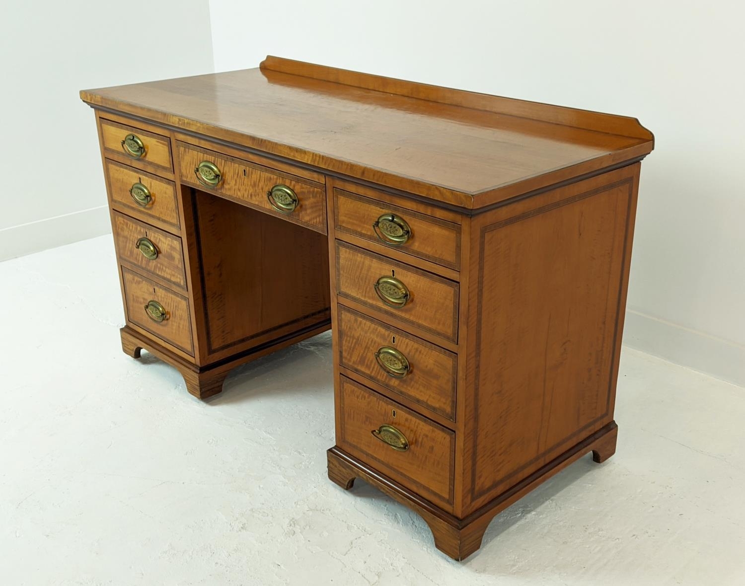 PEDESTAL DESK, Edwardian satinwood with crossbanded detail, 135cm x 58cm x 85cm H, raised on - Image 6 of 11