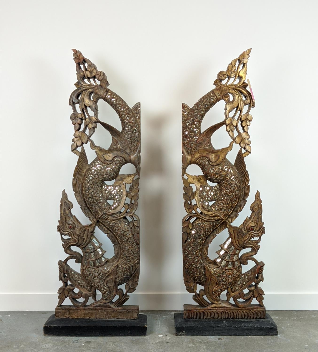 THAI NAGA TEMPLE GUARDIANS, carved wood in gilt and applied mirrored finish, 167cm H x 62cm W. (2)