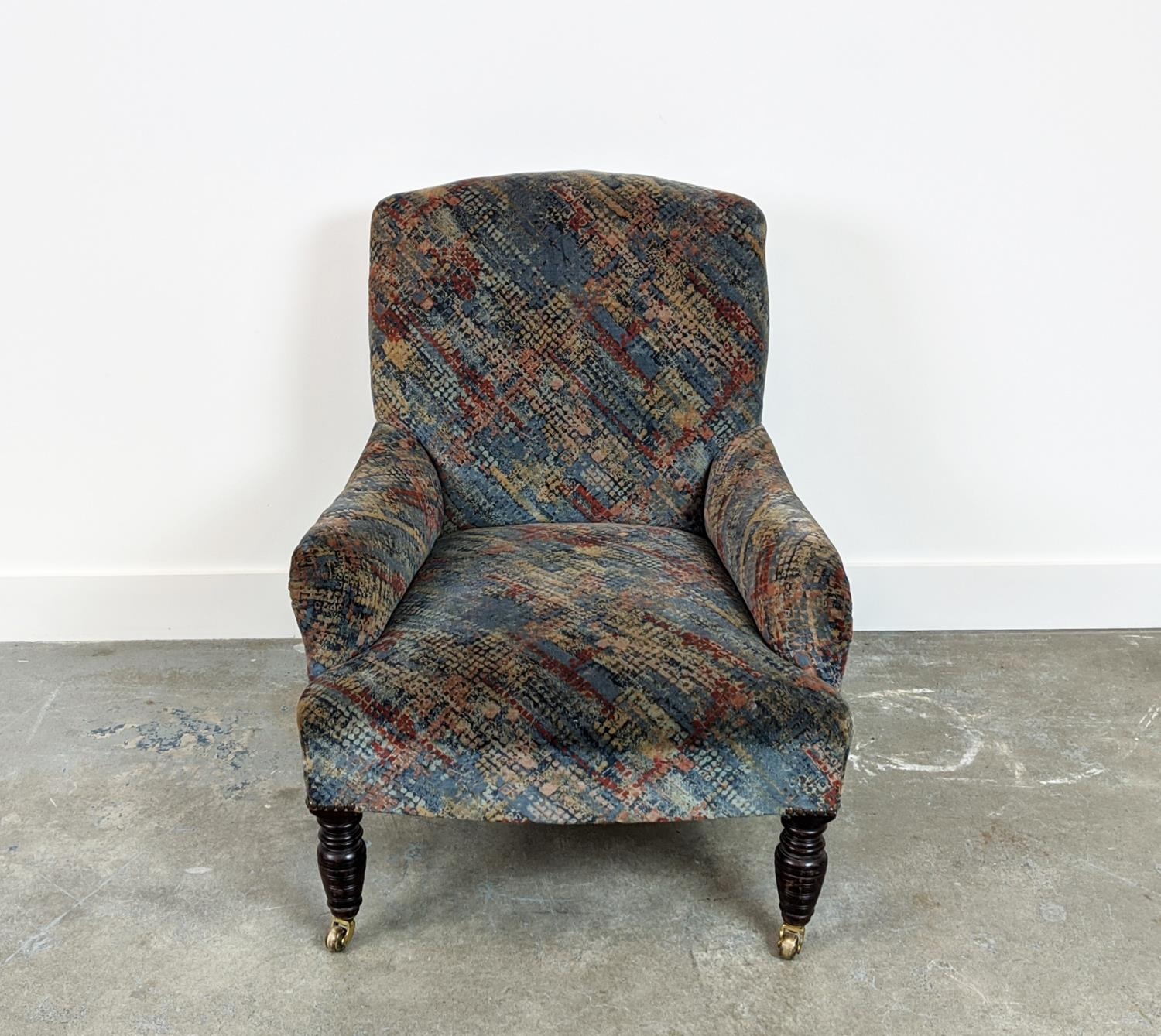 ARMCHAIR, late Victorian mahogany in patterned grey velvet on brass castors, 78cm H x 65cm x 74cm.