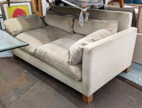 SOFA, with neutral upholstery on square supports, 183cm W x 83c m H x 96cm H.
