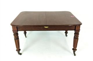 DINING TABLE, extendable, William IV mahogany with three extra leaves on carved supports, 108cm x