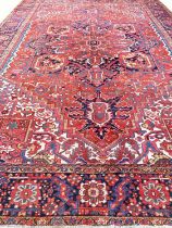 ANTIQUE PERSIAN HERIZ CARPET, 410cm x 299cm.