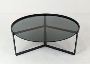 LOW TABLE, with a circular smoked glass top on a metal frame, 91cm W x 37cm H.