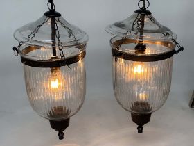 BELL JAR HALL LANTERNS, a pair, glass reeded tapering and bronze style mounted, 58cm H x 34cm. (2)