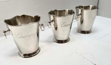 CHAMPAGNE BUCKETS, a set of three, polished metal, 23cm H x 22cm x 19cm. (3)