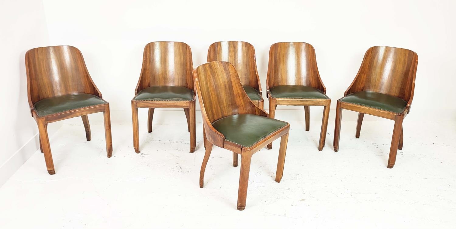 ART DECO DINING CHAIRS, a set of six, walnut, with curved backs and green leather seats, each 49cm W
