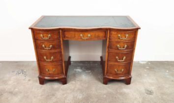 KNEEHOLE DESK, Georgian style, burr walnut with black leather top above nine bowed drawers, 75cm H x