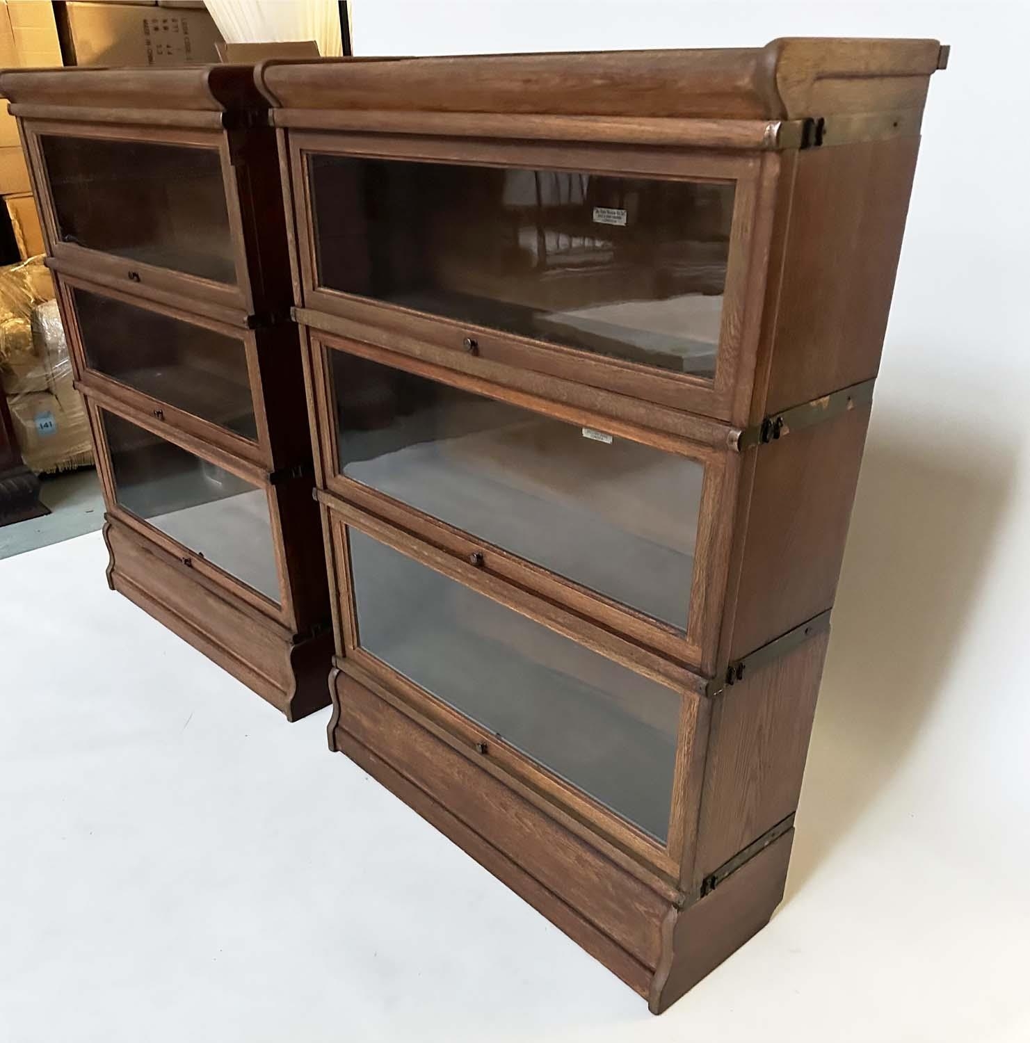 GLOBE WERNICKE BOOKCASES, a pair, early 20th century oak each with three glazed stacking sections, - Image 5 of 6