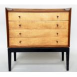 CHEST, 1970s maple with four long drawers ¾ gallery and ebonised supports, 77cm W x 77cm H x 41cm D.