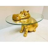 HIPPOPOTAMUS TABLE, glass top gilt resin base, 65cm H x 45cm x 50cm L.