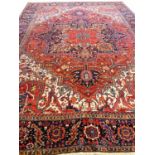 ANTIQUE PERSIAN HERIZ CARPET, 375cm x 277cm.