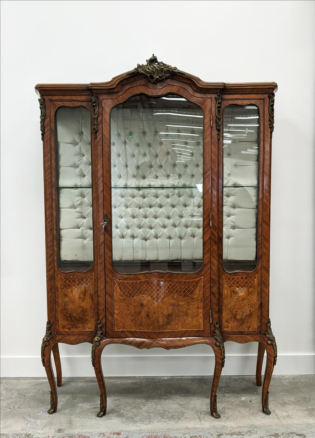 VITRINE, Louis XV style tulipwood, burr elm and gilt metal mounted with glazed door enclosing a