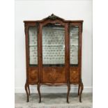 VITRINE, Louis XV style tulipwood, burr elm and gilt metal mounted with glazed door enclosing a