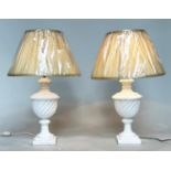 TABLE LAMPS, a pair, Italian alabaster of spiral urn form with stepped square bases and shades, 66cm